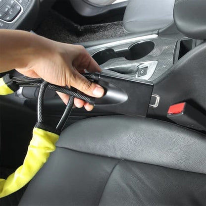 Seat belt socket fixed steering wheel lock